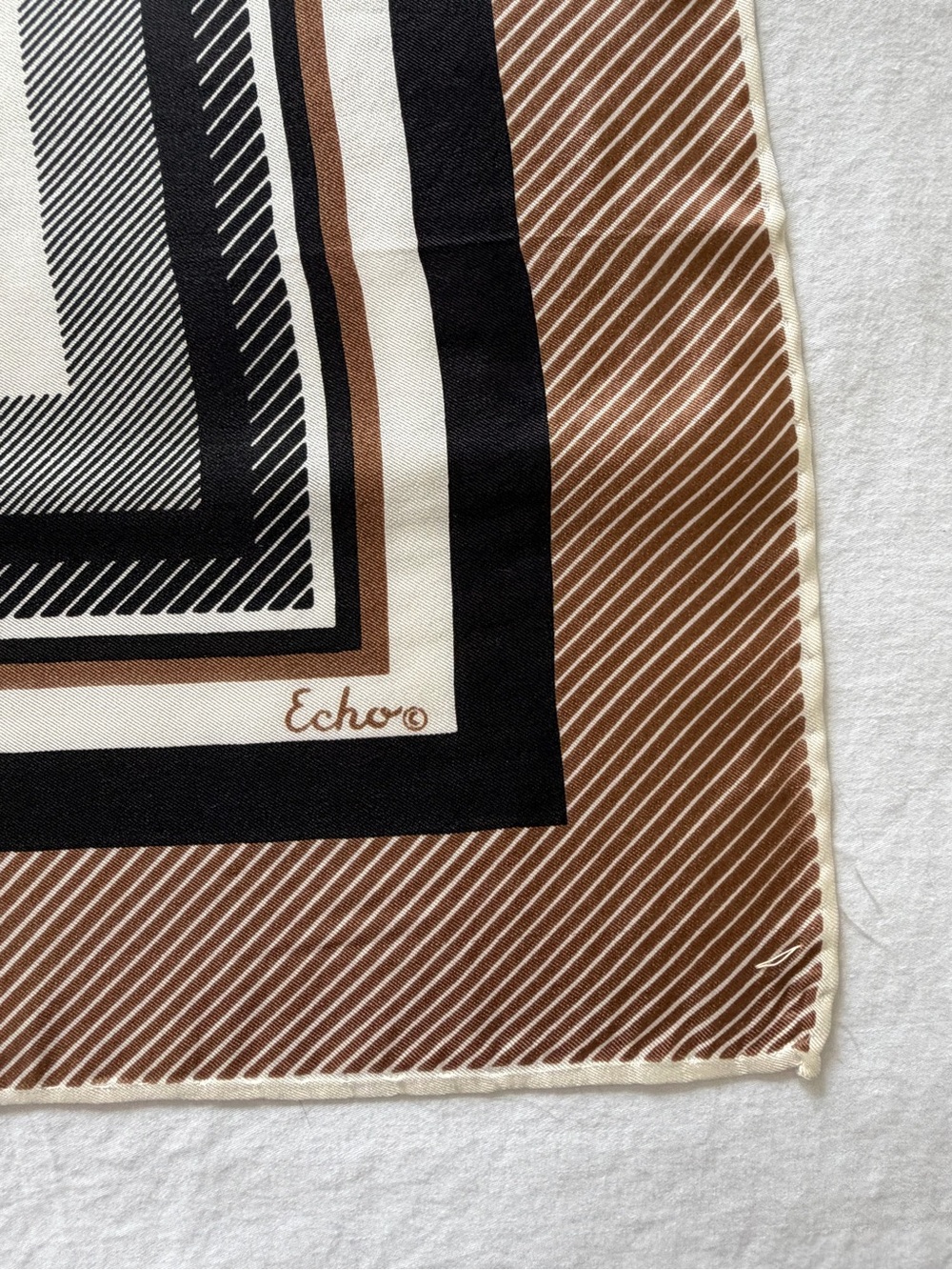 Echo Vintage Echo signed rolled-edge silk scarf featuring a brown, black, and wh - Picture 4 of 10